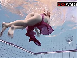 Smoking hot Russian ginger-haired in the pool